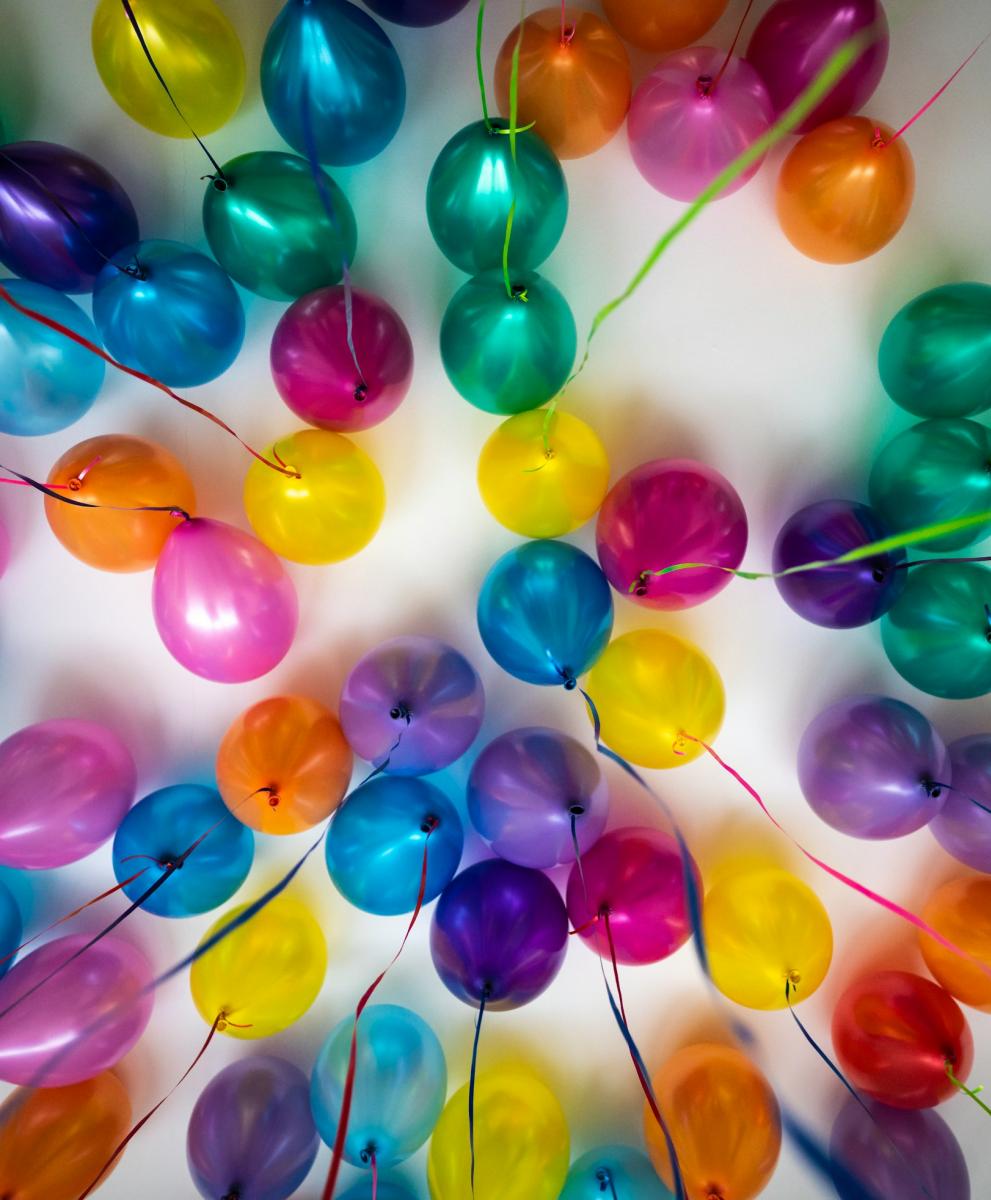 An image of balloons symbolizing celebration and achieving a milestone.